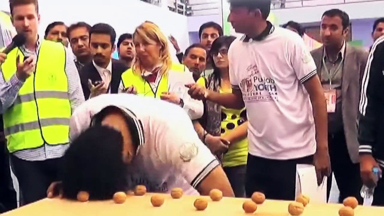 Most-walnuts-smashed-with-a-nunchacku-in-one-minute---Spotlight