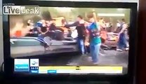 Polish TV talking about sick immigrant elders and children but showing healthy young men with smartphones