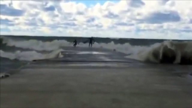 Surfers at Lake Huron hit by extreme weather
