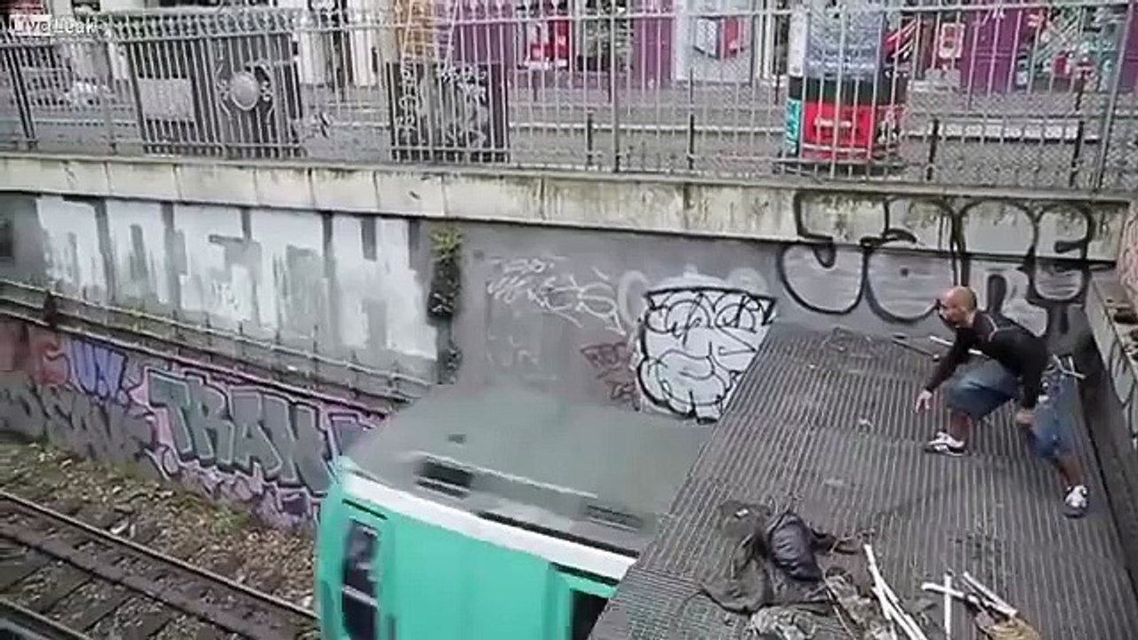 Crazy French Guy Jumps On The Roof Of A Train - VideosMunch