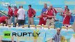 USA: See competitive eater chow down 62 hot dogs in 10 minutes