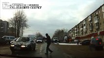 LiveLeak.com - Man doesn't get hurt by car running him over. hurts self instead.