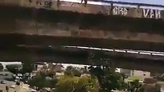 MAN JUMPS viaduct