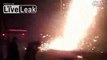 People throw molten iron in air to make iron fireworks for Chinese lunar new year