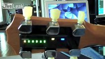 LiveLeak.com - Tronical Tuning, Automatic Robotic Guitar Tuning System