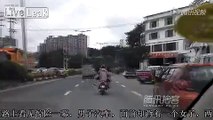 Woman rides man who rides motorbike