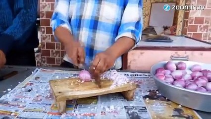 Il coupe des oignons plus vite que son ombre !