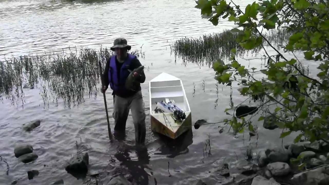 Fishing for catfish from a cardboard boat