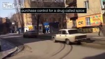 LiveLeak.com - Young Russian nationalists attack a kiosk run by old lady with flares and hammers for selling drugs
