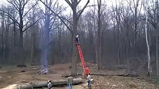 Guy cutting tree branch fail