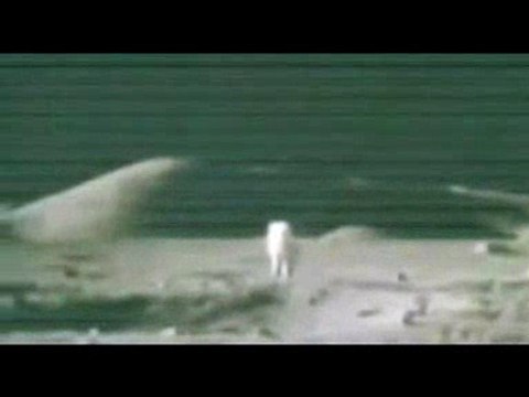 Moon Hoax Apollo 17- Remote Control Cable Trackers Seen Above The Astronaut