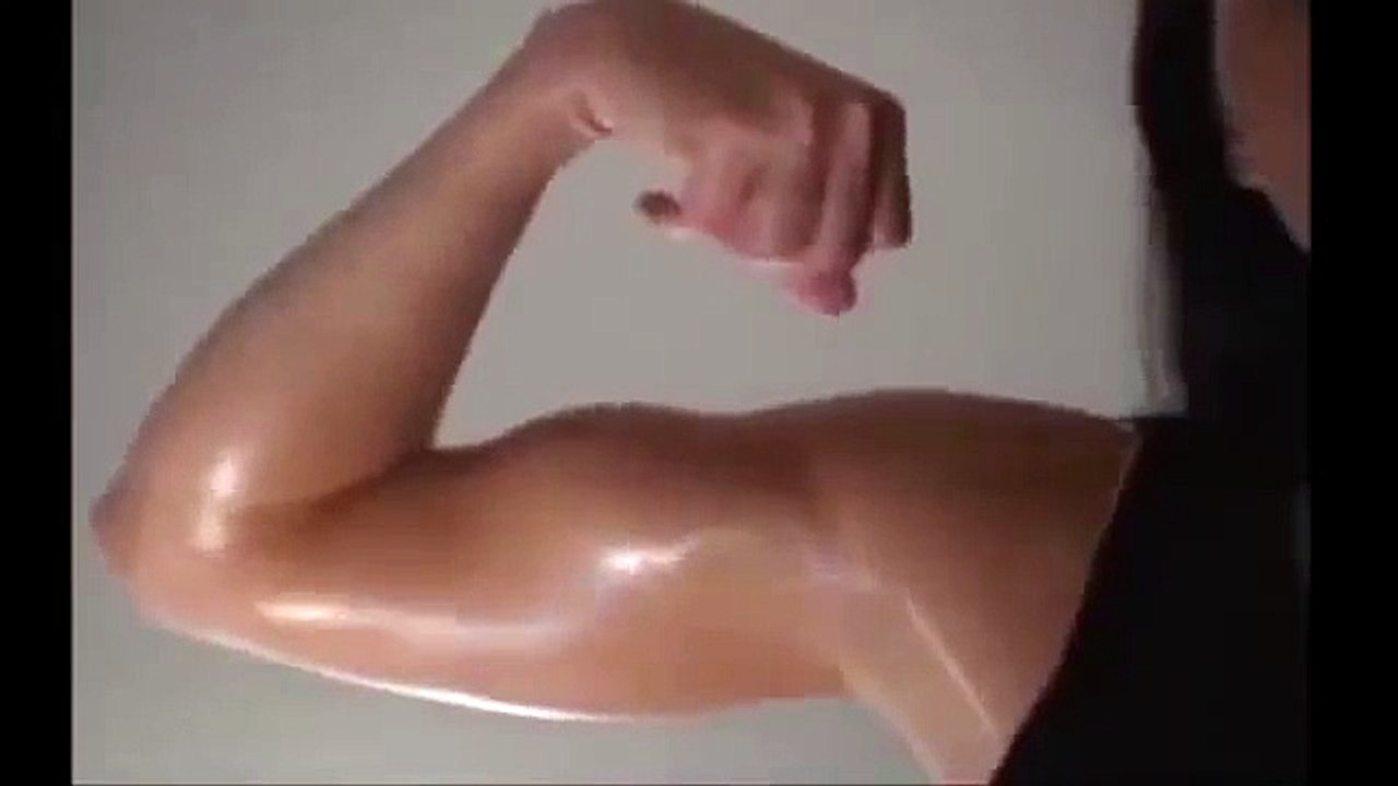 Girl Flexing her Biceps Muscles