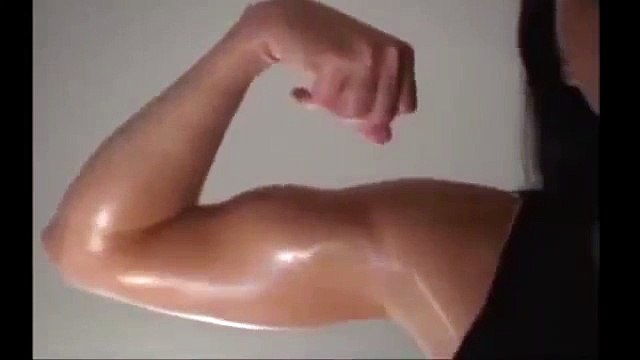 Girl Flexing her Biceps Muscles