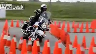 LiveLeak.com - Police Officer Owns Motorcycle Skill Course.