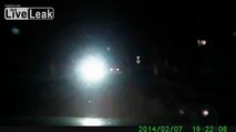 Driver Narrowly Avoids Drunk Laying on Road