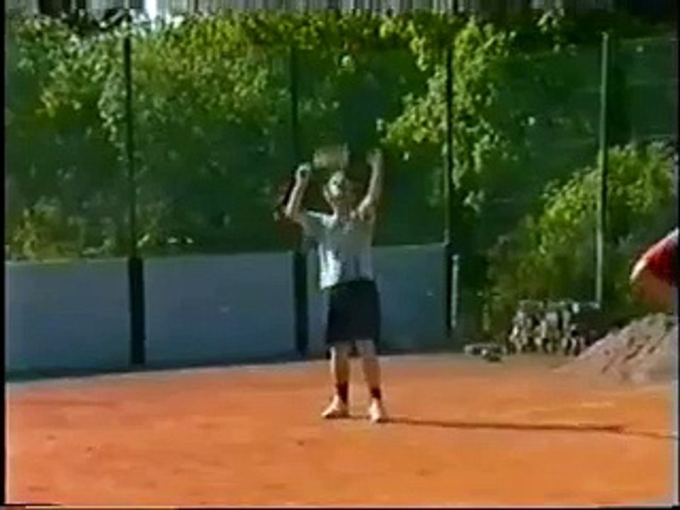 Régis fait du tennis