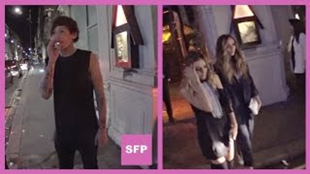 Louis Tomlinson talks with paparazzi as Perrie & Jade of Little Mix exit club in London