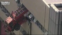 Un camion casse les murs et sort du 3e étage
