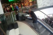 Two Old Men try to walk in wrong way escalator just for a free burger