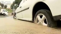 LiveLeak.com - Dispute Leads to Car being Concreted into Roadworks