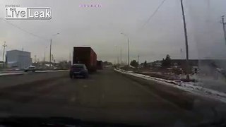 LiveLeak.com - Terrible driver causes roll-over accident