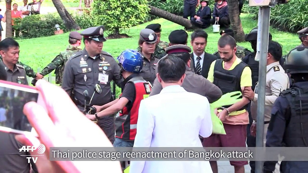 Thai police stage bombing reenactment with prime suspect