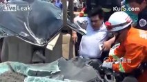 Small car crushed by big cement mixer truck