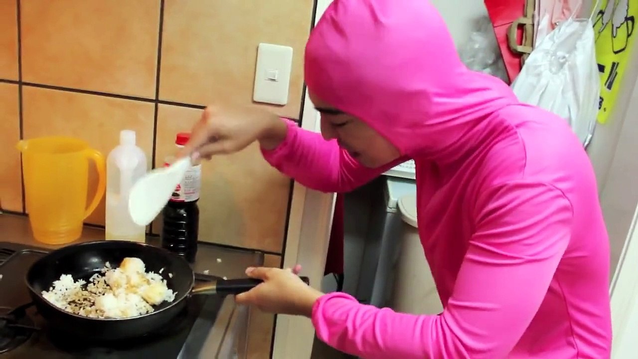 PINK GUY COOKS FRIED RICE AND RAPS