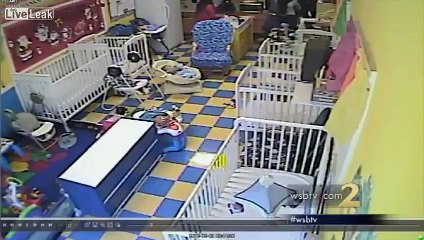 LiveLeak.com - Day Care Workers Get Into Brawl With Father Holding Baby