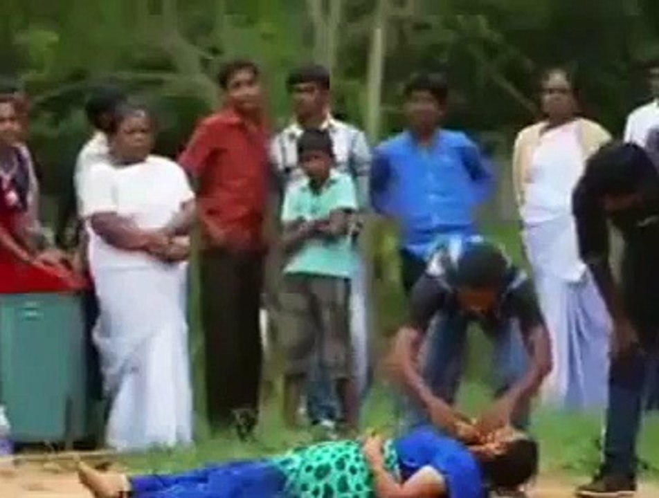 Stunts man cut the coconut with talvaar on girl neck