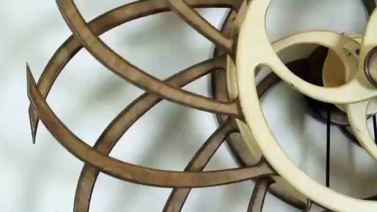hypnotizing kinetic wooden sculptures
