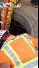 LiveLeak.com - Worker In Manhole Gets Caught In Steam Explosion