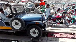 Loading Jeep on Boat at Attabad in Gilgit by PakTour