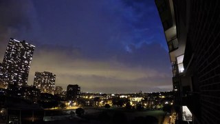 Time lapse Rolling lightning storm travels over Chicago