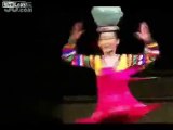 North Korean girl with pot on head does 90 spins in 30 secs to celebrate Kim's birthday