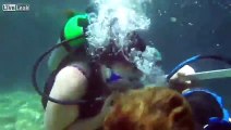 Woman nearly drowns when her partner proposes to her whilst scuba diving