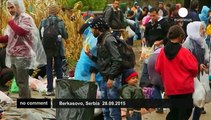 Migrants cross the border between Serbia into Croatia