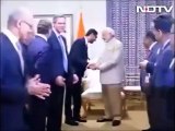 Microsoft CEO Satya Nadella Wiping his Hands after Shaking Hands with Indian PM Narendra Modi