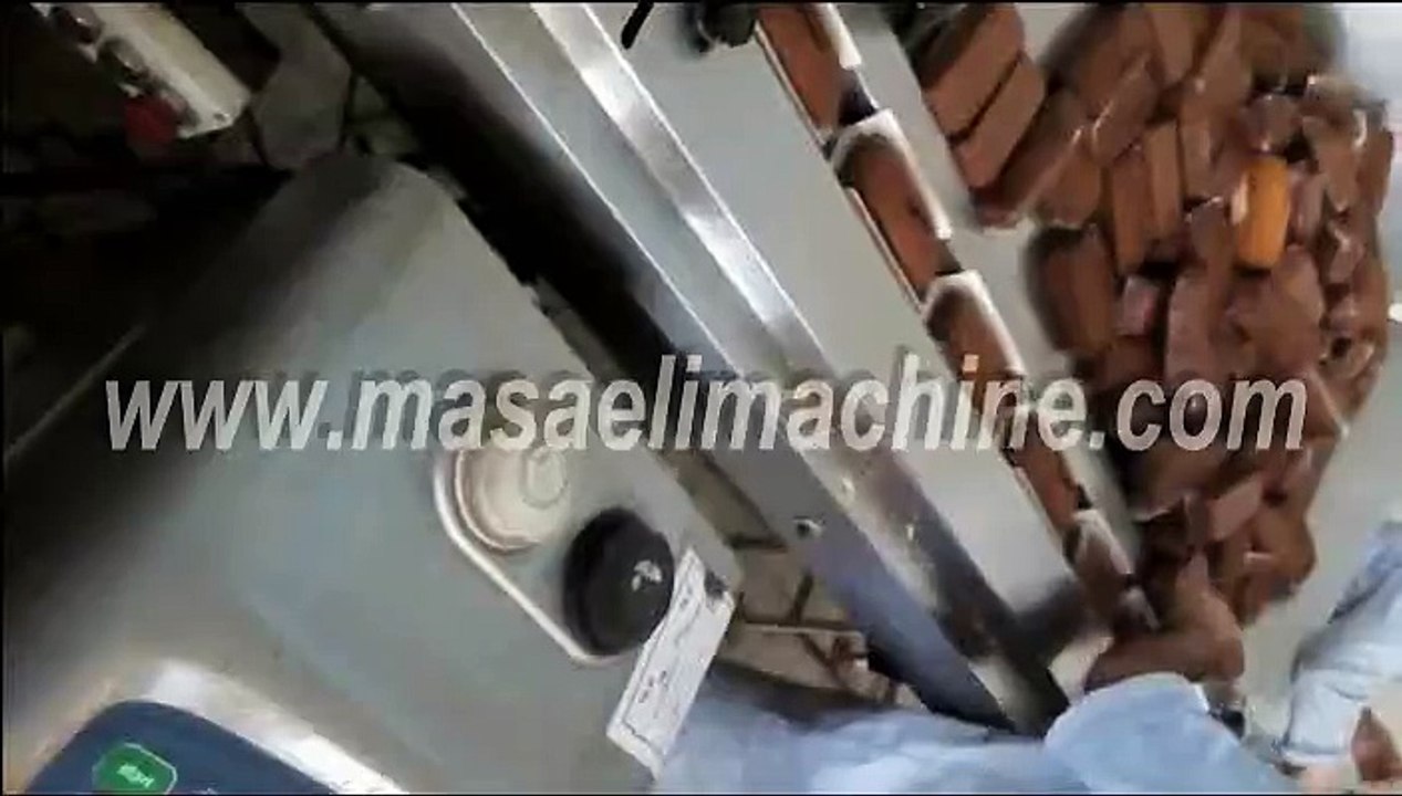 دستگاه بسته بندی کیک،بسته بندی کیک لایه ای، کیک وکلوچه،کیک یزدی صنایع مسائلی