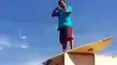 LiveLeak.com - Surfer dude wipes out while surfing on roof