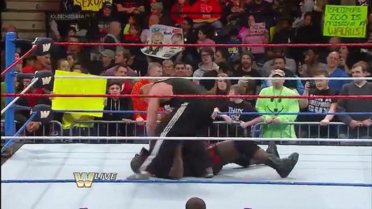 Brock Lesnar dislocates Mark Henry's elbow