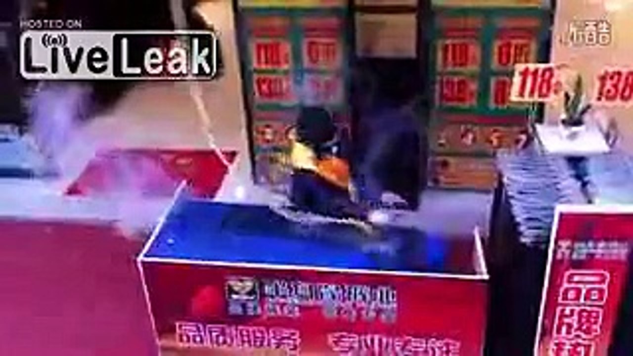 Guy with eyes blindfolded can still iron for customers