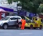 Chinese Woman Fights Back Against Car Towwing