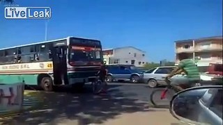 Lucky cyclist, bus driver doesn't give a f**ck