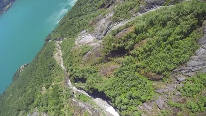 Epic wingsuit flight over breathtaking landscape