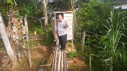 RV. CARRASQUILLO PASANDO UN PUENTE DE CAÑA