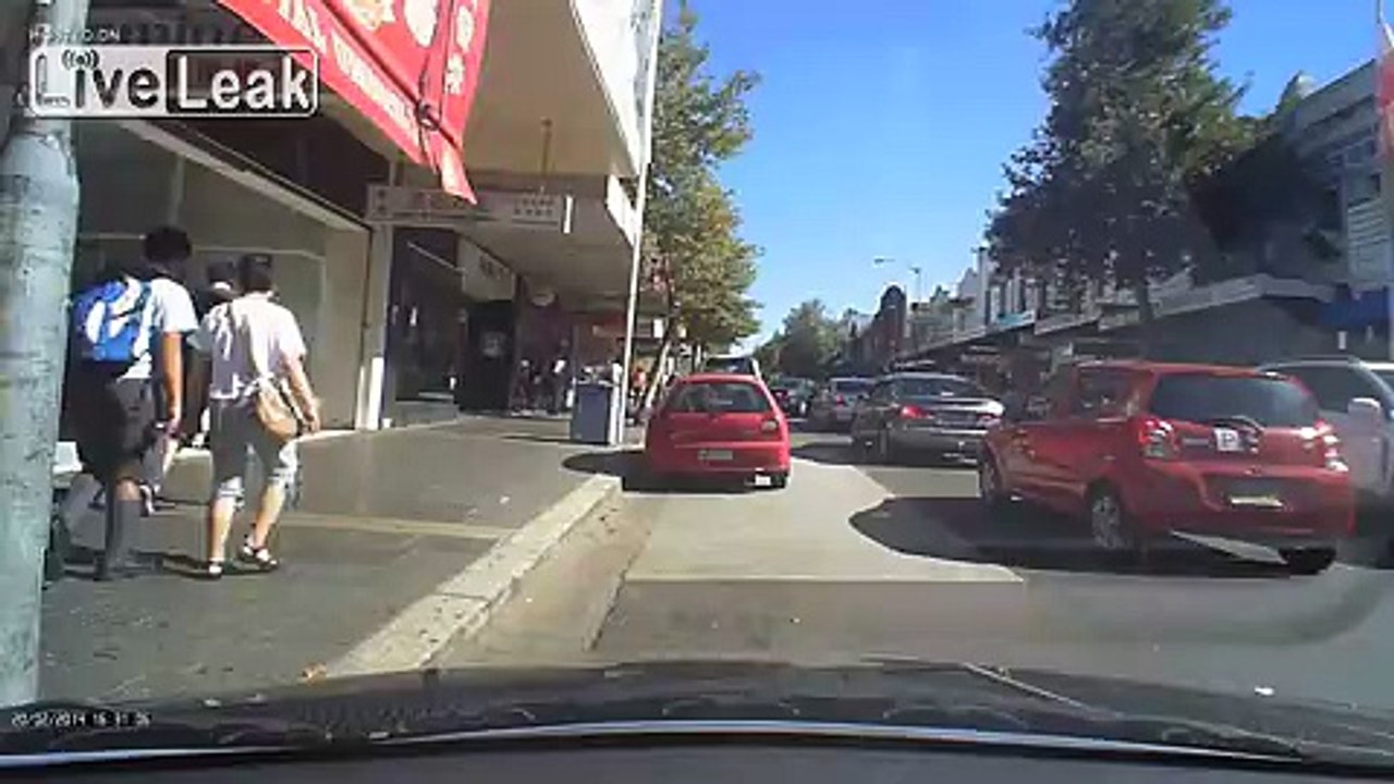 Asian trying to reverse park