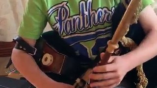 Impressive Kid Shreds on the Bag Pipe