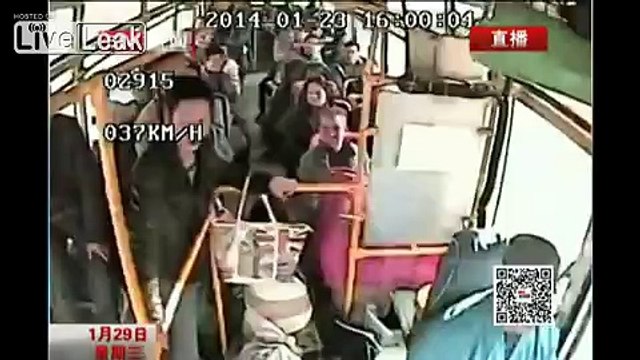 Crazy asshole on a bus grabs the wheel and nearly kills a Motorbike rider