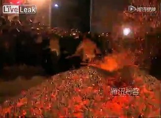 Villagers runs on burning charcoal to celebrate Chinese new year